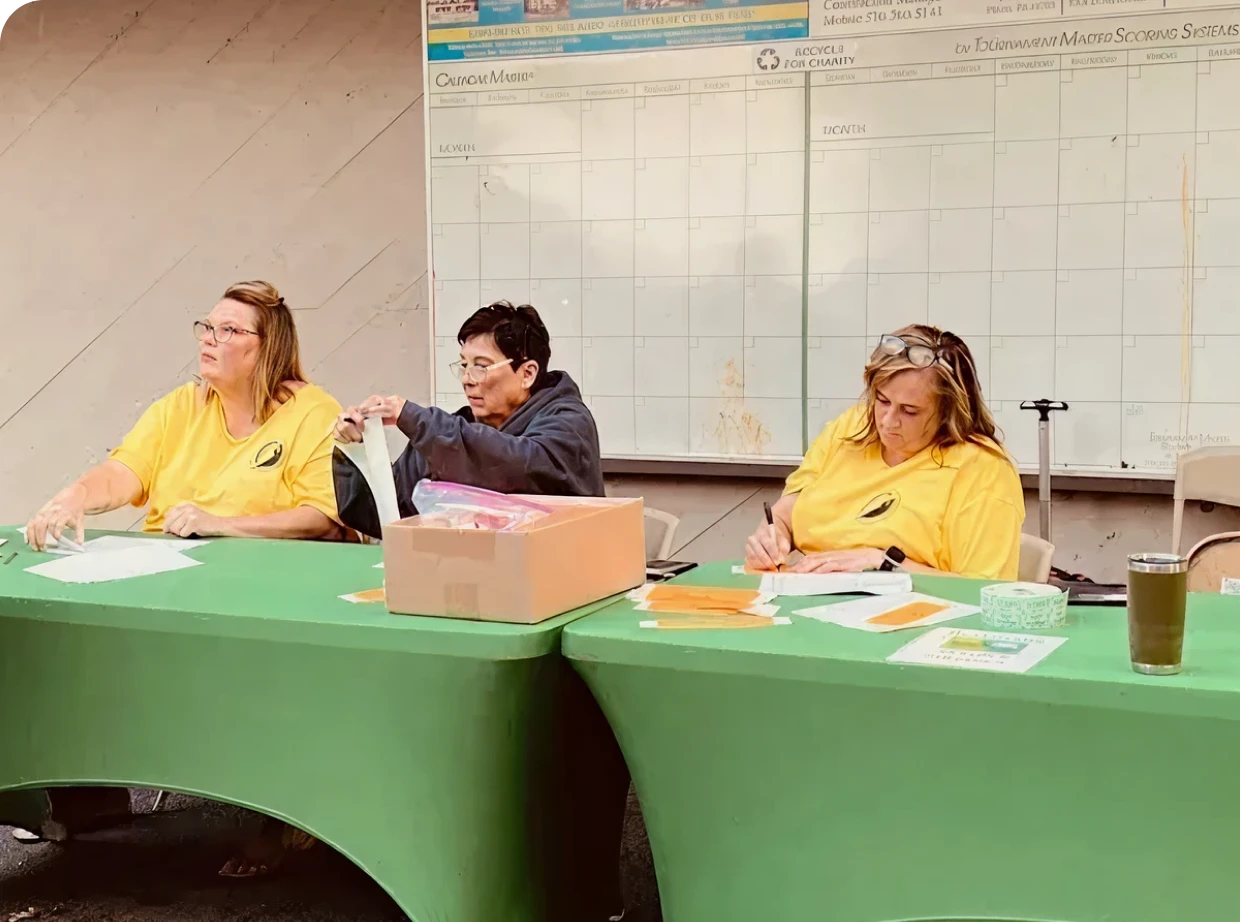 People working at a registration table